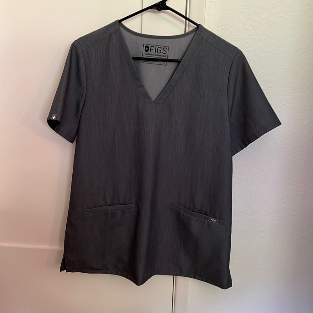 Figs grey three pocket scrub top, size M.